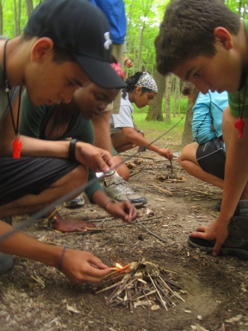 Students practice building a fire in the Delaware Water Gap.