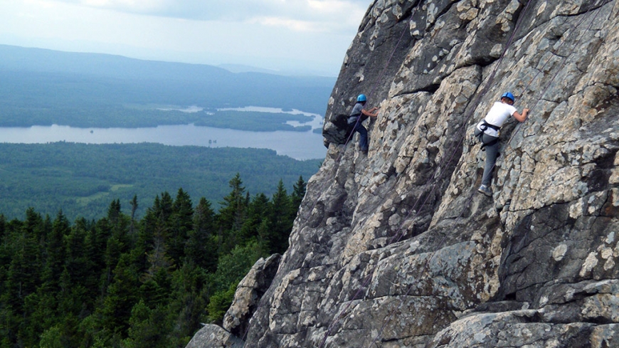 Rock climbing during a Maine Wilderness Instructor Development Course