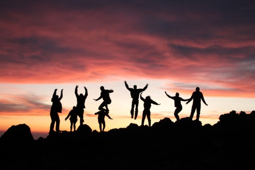 students enjoying a sunset