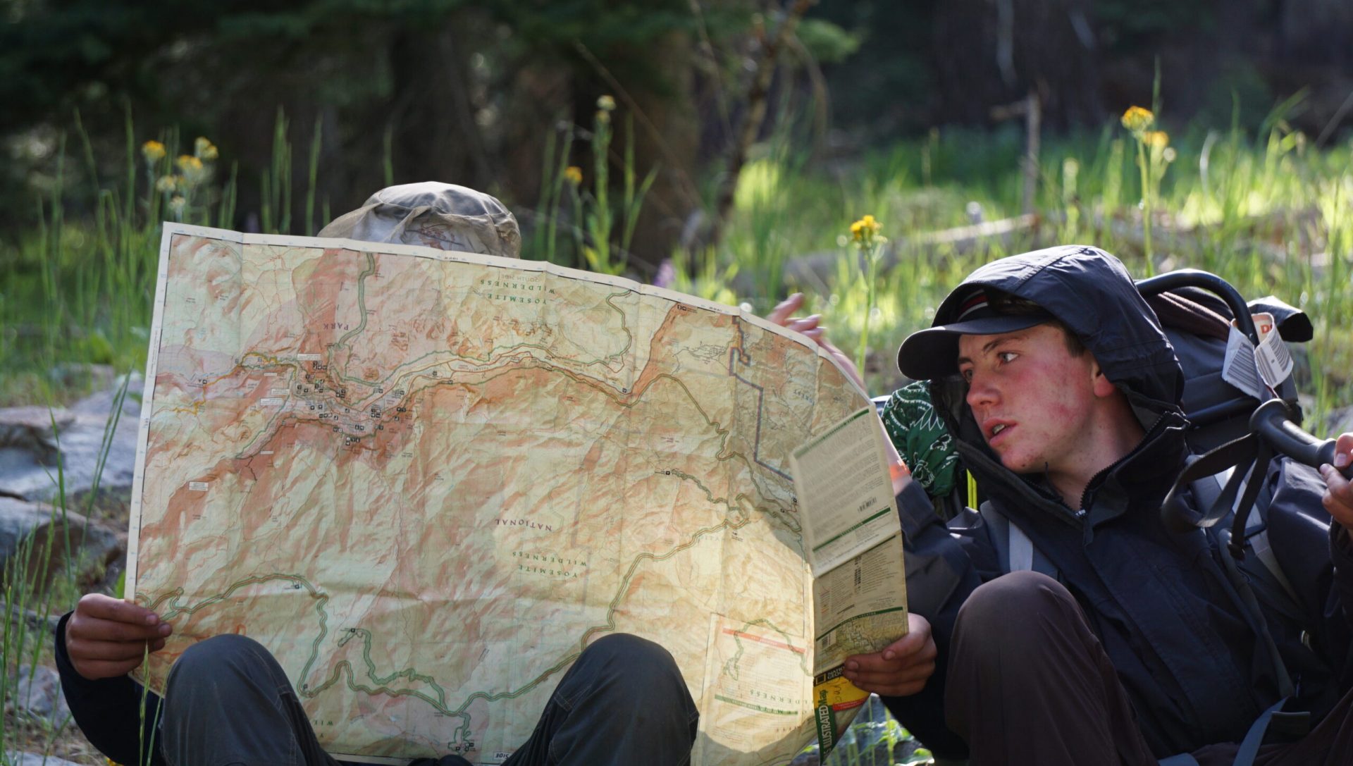 students read map in the backcountry