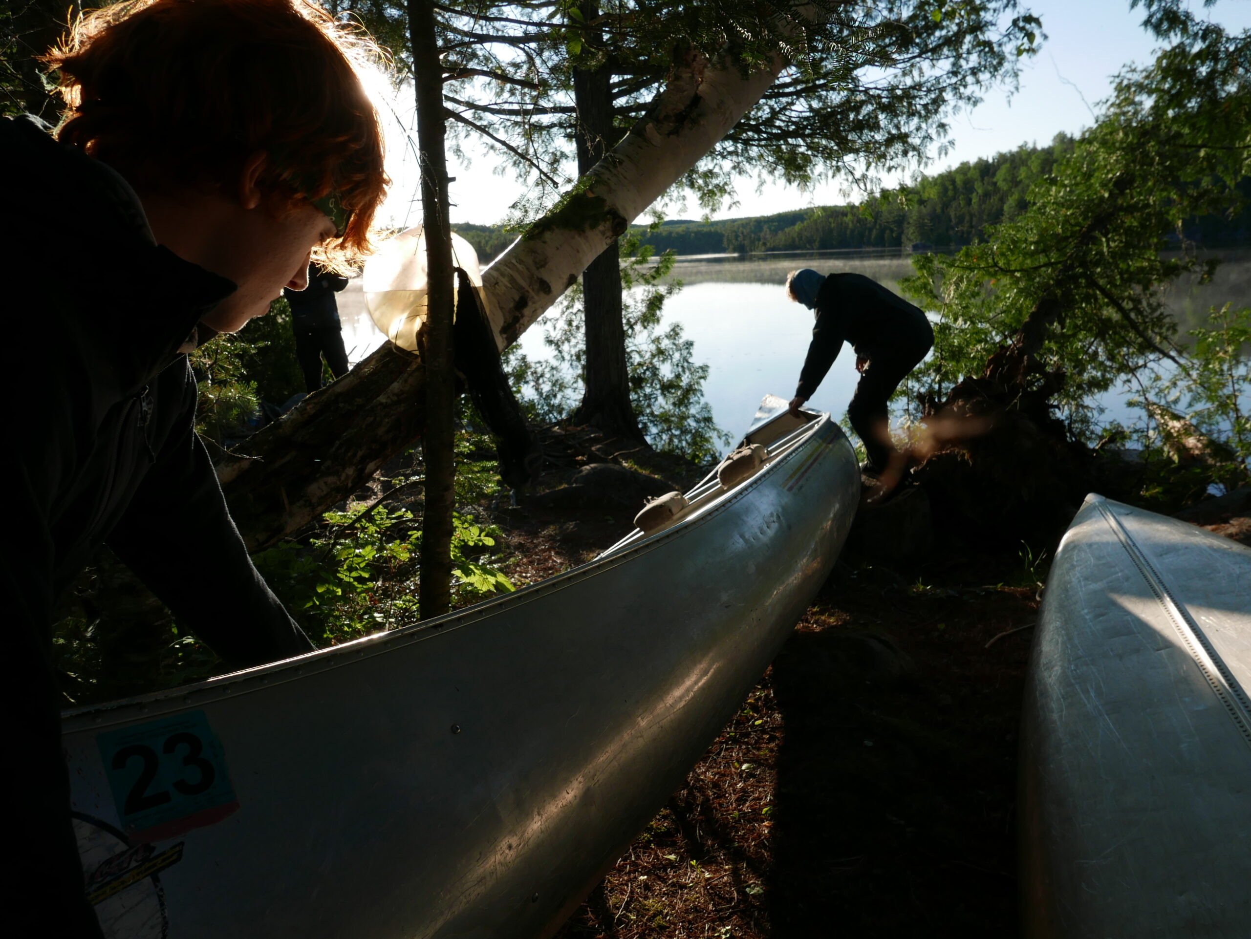 Intercept students put canoes into water