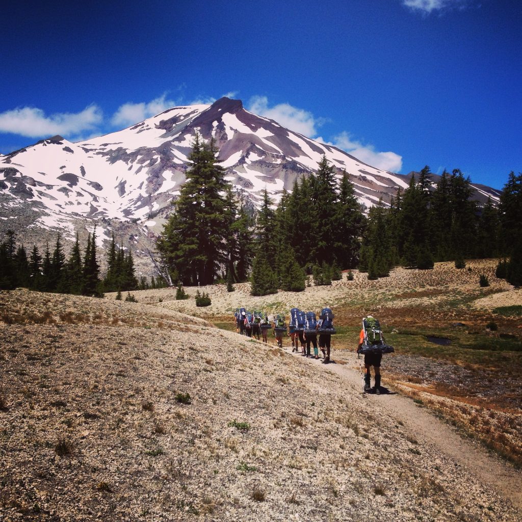 Photo shows a student on a Northwest Outdoor Educator expedition, courtesy of Trevor McKee.