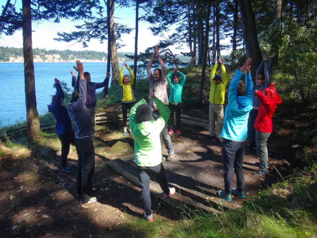 Photo shows students on a sea kayaking expedition, courtesy of Luke O'Neill.