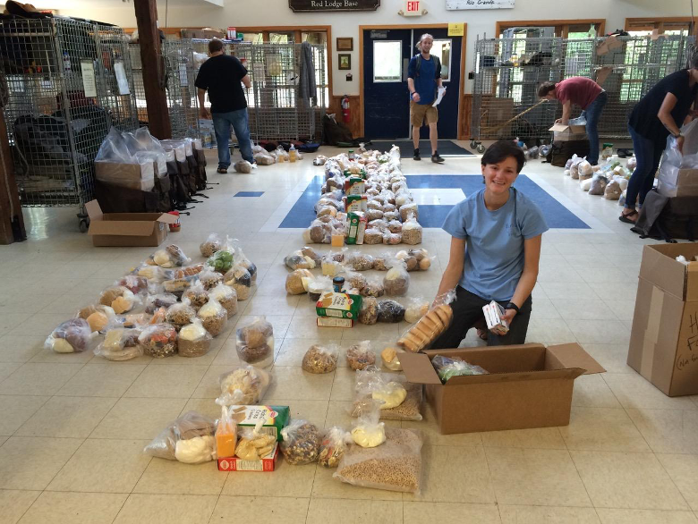 Outward Bound Instructors prep food for a 30-day course.