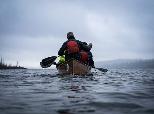 Students canoeing on expedition.