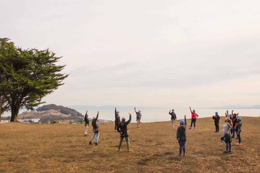 students in a COVID friendly circle-up